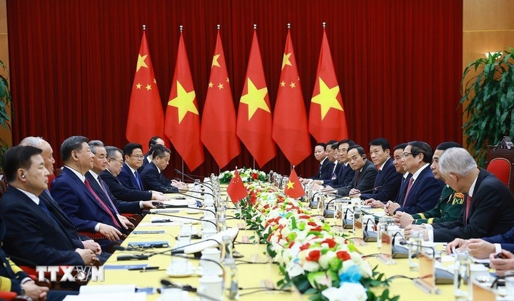 Thủ tướng Phạm Minh Chính hội kiến Tổng Bí thư, Chủ tịch Trung Quốc Tập Cận Bình. (Ảnh: Dương Giang/TTXVN)