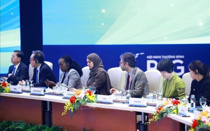 Các đại biểu tham dự Phiên thảo luận cấp cao "Chuyển đổi xanh bền vững, lấy con người làm trung tâm". (Ảnh: Dương Giang/TTXVN)