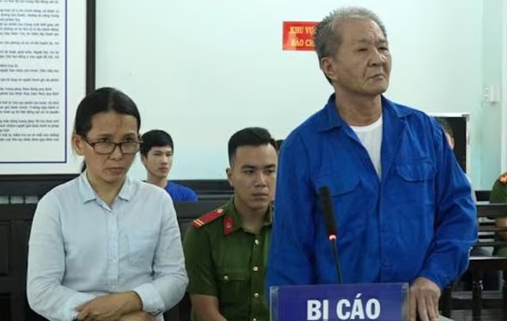 Bị cáo Nguyễn Đình Trung và Nguyễn Thị Hoa tại toà. (Ảnh: NM)