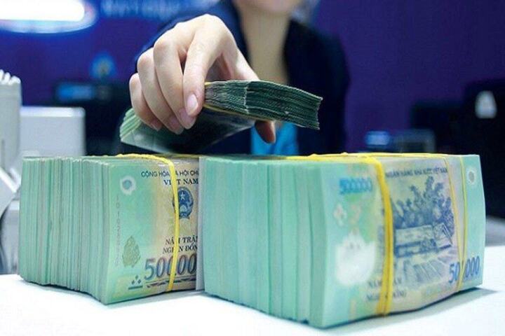 Tiền gửi ngân hàng vẫn tăng mạnh dù lãi suất huy động thấp. (Ảnh minh họa)