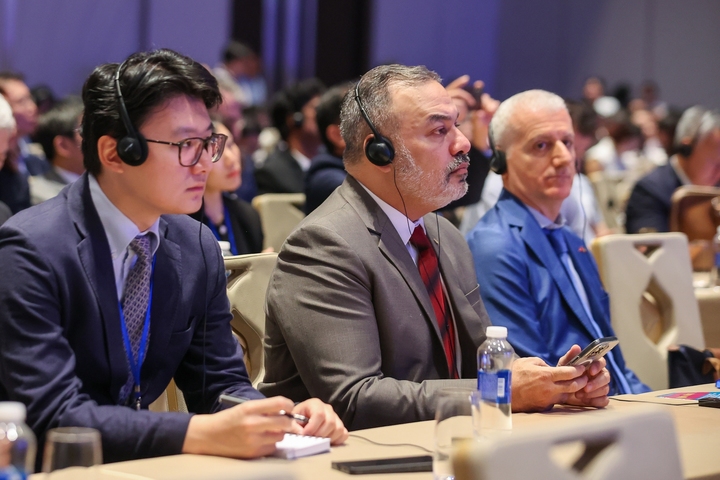 Việc thành lập Trung tâm gtài chính Quốc tế tại Việt Nam thu hút sự quan tâm của giới chuyên gia, doanh nghiệp trên thế giới. (Ảnh: VGP)