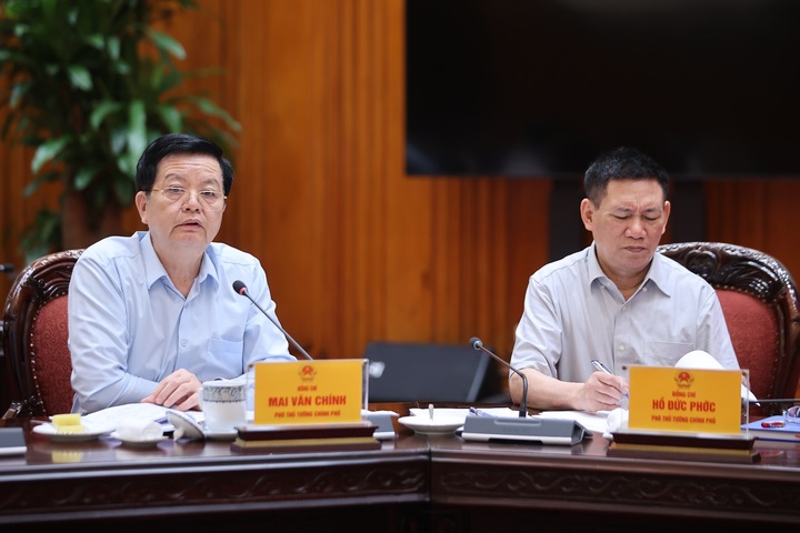 Các Phó Thủ tướng Mai Văn Chính và Hồ Đức Phớc tham dự cuộc họp. (Ảnh: VGP/Nhật Bắc)