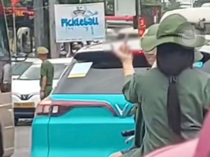 Les étudiants se sont comportés de manière inappropriée au passage du convoi A80. (Photo extraite du clip)
