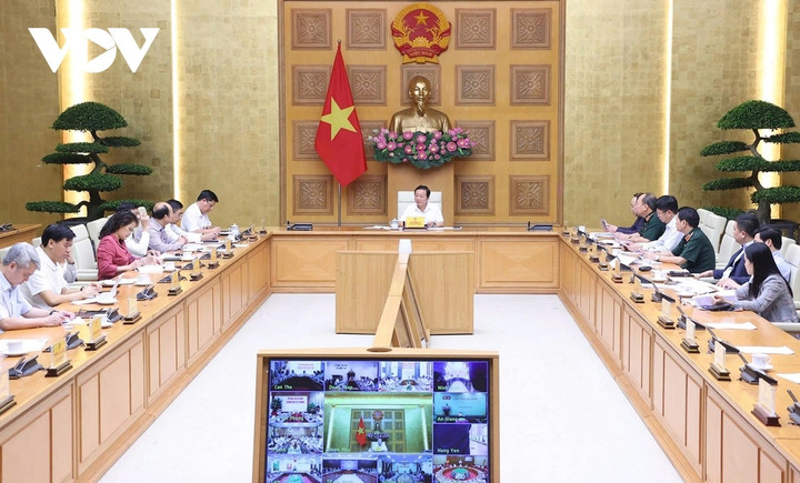 Các thành viên Ban Chỉ đạo quốc gia về phòng, chống khai thác hải sản bất hợp pháp, không báo cáo, không theo quy định (IUU) tại điểm cầu Trụ sở Chính phủ.