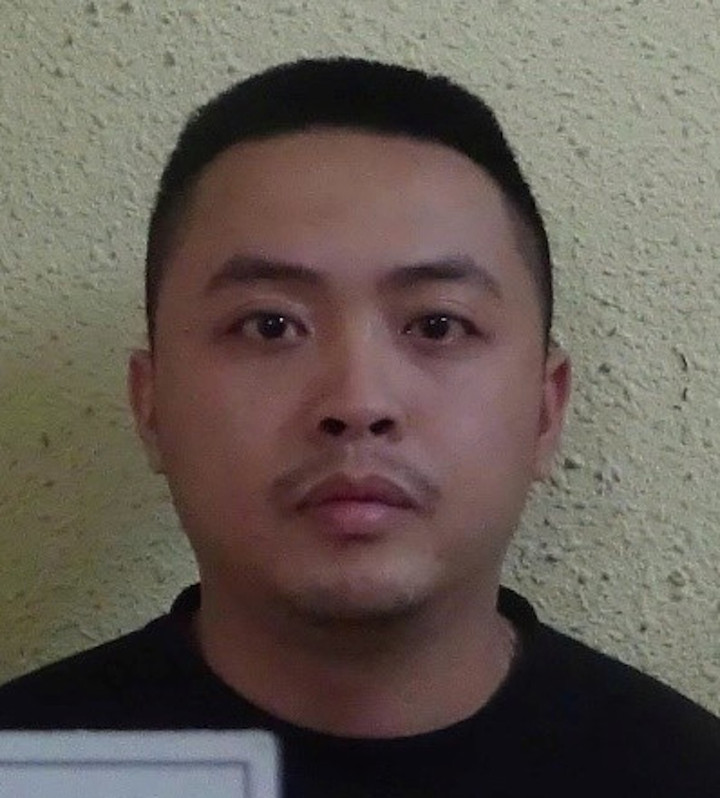 Lê Bá Linh tại cơ quan công an.