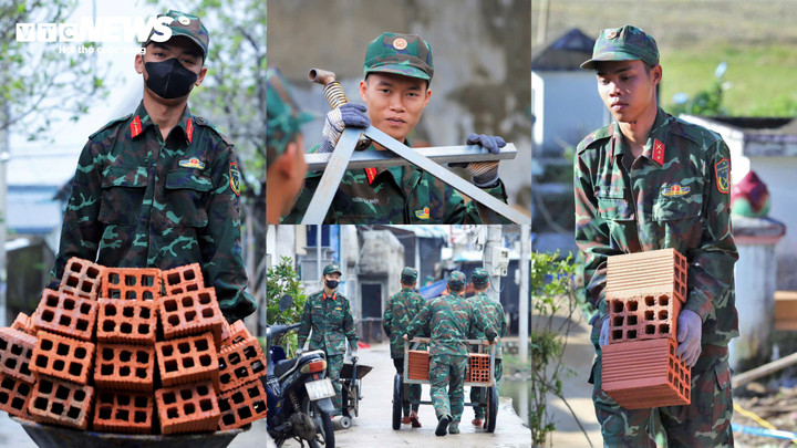 Mùa mưa bão, con đường vào khu vực thi công lầy lội, khoảng cách nhỏ hẹp khiến xe cơ giới khó tiếp cận, các cán bộ, chiến sĩ nhẫn nại vận chuyển từng bao xi măng, từng mẻ cát, gạch...