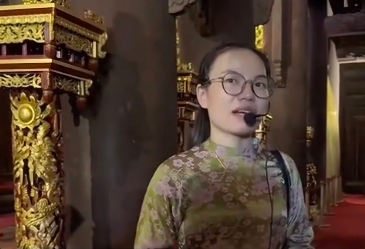 Hướng dẫn viên du lịch tại di tích Lam Kinh liên quan tới vụ việc. (Ảnh cắt từ clip)