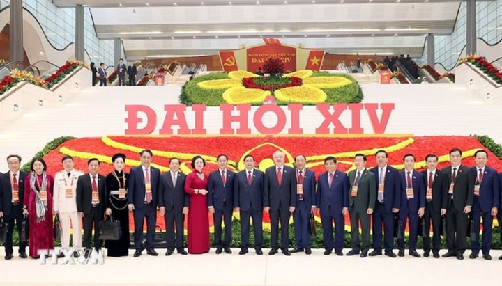 Các đại biểu dự phiên khai mạc Đại hội chụp ảnh lưu niệm. (Ảnh: TTXVN)