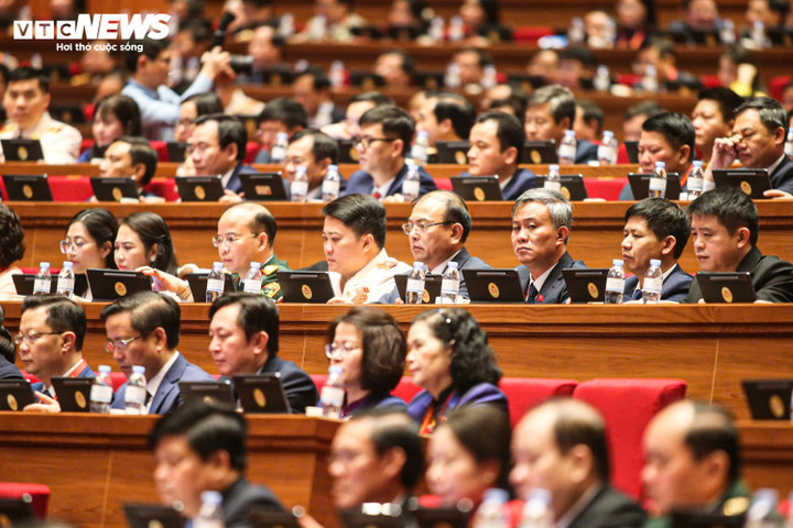 Các đại biểu dự phiên thảo luận tại hội trường về các văn kiện Đại hội, sáng 21/1. (Ảnh: Duy Thành)