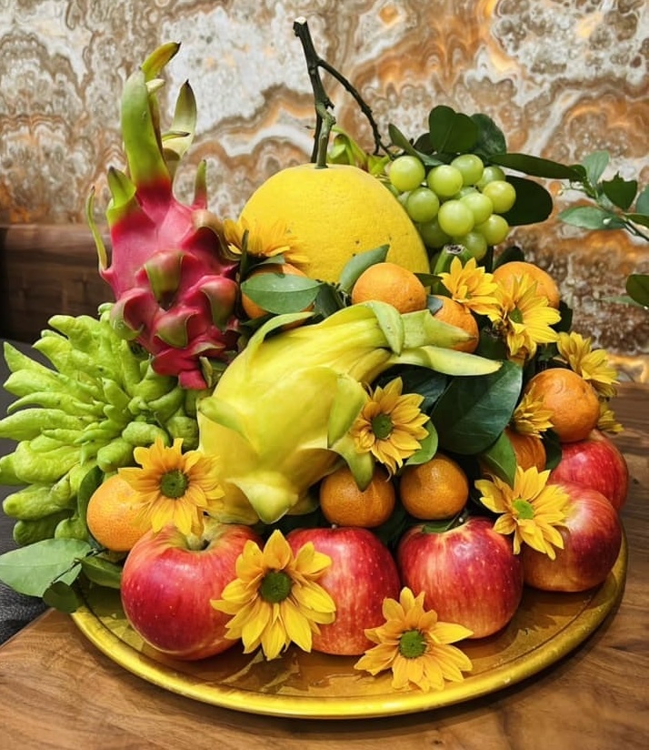 Cách bày mâm ngũ quả ngày Tết có nhiều thay đổi. (Ảnh: Ngô Tuyết Mai)