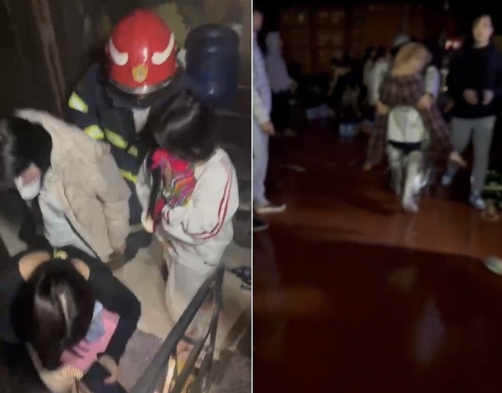 Lực lượng cảnh sát chữa cháy đưa người bị nạn ra ngoài an toàn.