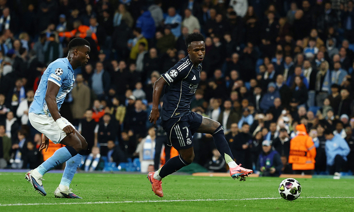 Vinicius ghi 2 bàn giúp Real Madrid thắng Man City. (Ảnh: Reuters)