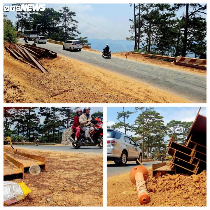 Rào chắn đường bị bỏ dở, các thanh sắt nằm ngay mép đường phơi nắng phơi sương là những cái bẫy "chết người" đối với các phương tiện vào ban đêm.