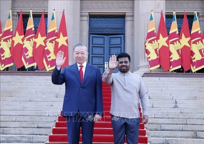 Tổng thống Sri Lanka Anura Kumara Dissanayake chủ trì lễ đón Tổng Bí thư, Chủ tịch nước Tô Lâm. Ảnh: TTXVN