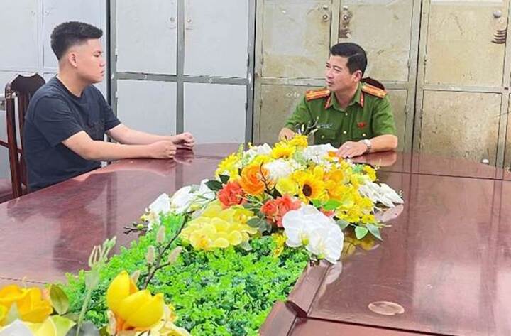 Trần Bình Minh tại cơ quan công an.