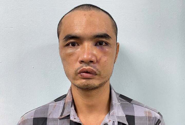 Trần Văn Long tại cơ quan công an.