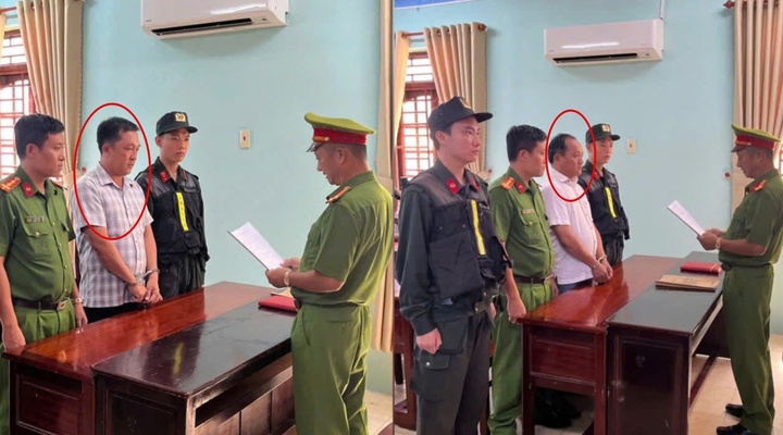Cơ quan cảnh sát điều tra Công an tỉnh An Giang thực hiện lệnh bắt tạm giam đối với Tô Hoàng Dũ và Trương Văn Tiền. (Ảnh: Công an An Giang)