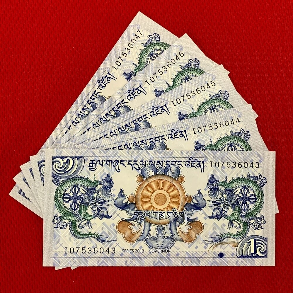 Tiền con rồng Bhutan. (Ảnh: Dichvudoitien)