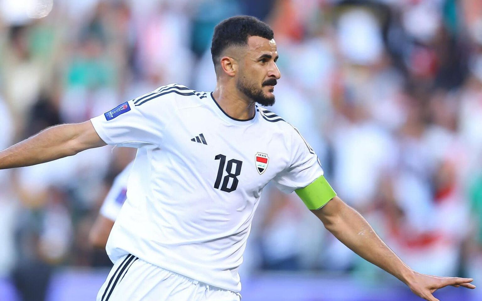 Aymen Hussein ghi bàn ấn định chiến thắng cho Iraq.
